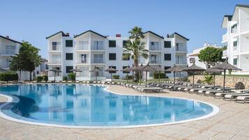 2 outdoor pools, pool umbrellas, pool loungers