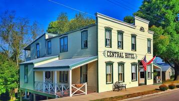 A two-story building with a sign reading "Central Hotel".