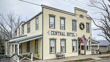 A two-story building with a sign reading "Central Hotel."