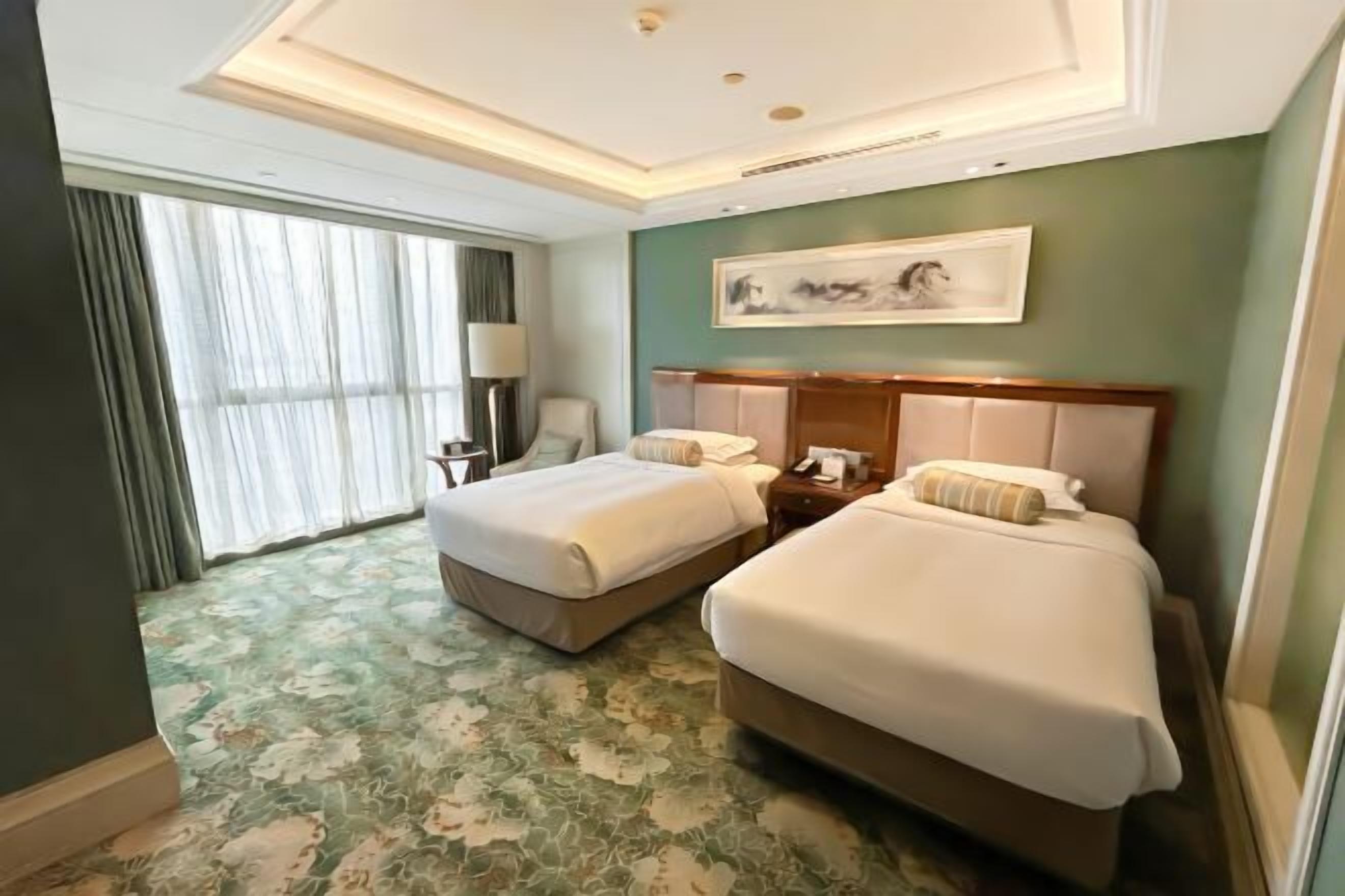 Premium bedding, down comforters, minibar, in-room safe