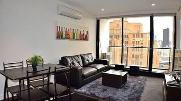 Standard Apartment, 2 Bedrooms, Balcony, City View | Living area | 42-inch flat-screen TV with cable channels, TV
