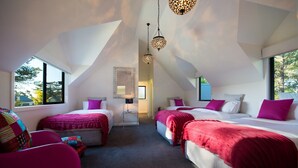 A modern bedroom with two beds, a chair, and a desk. - Artemis Retreat (Daylesford)