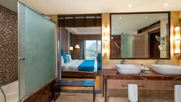 Express Suite (Spacious Room, Bath Tub) | Bathroom | Free toiletries, hair dryer, slippers, towels