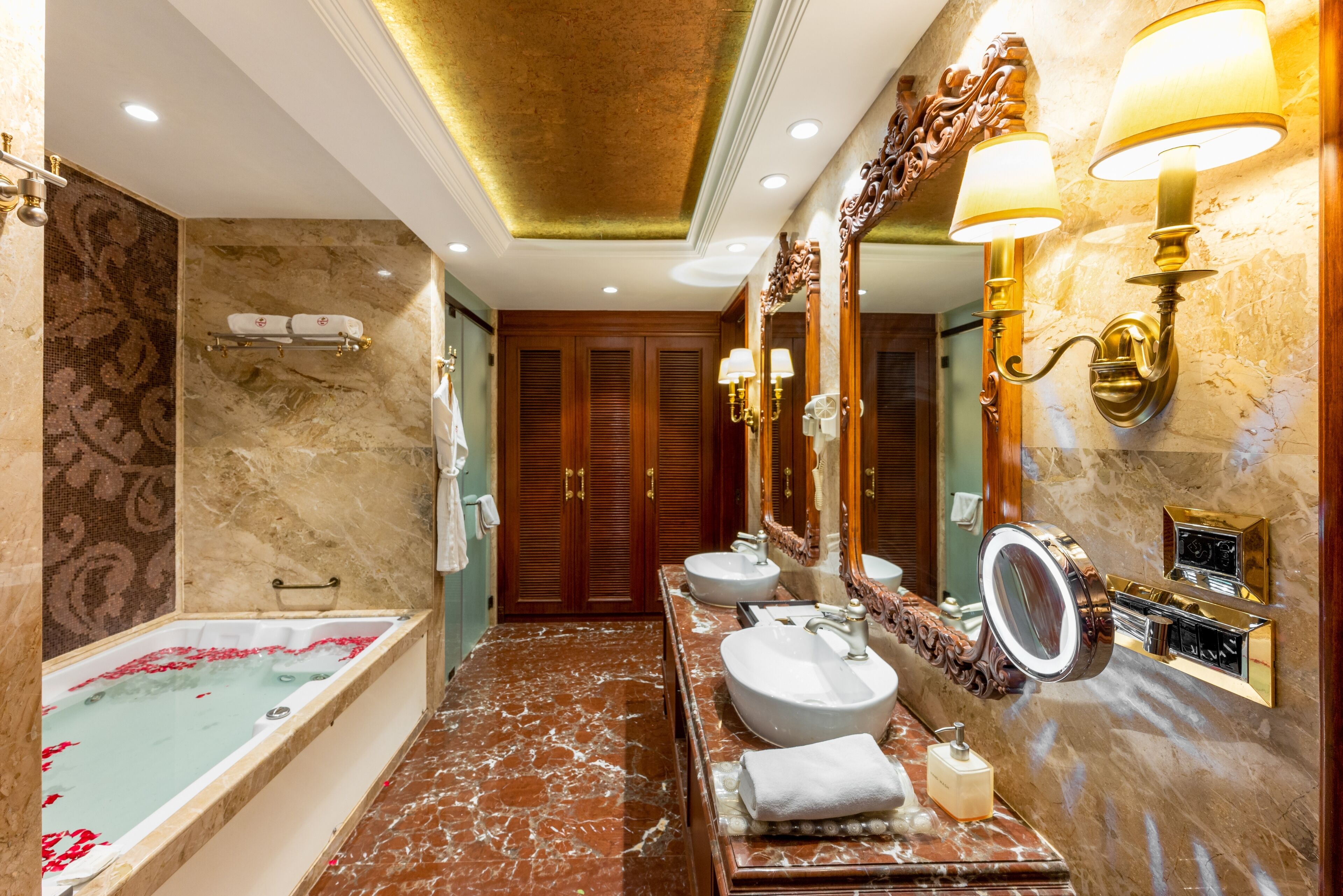 presidential suite (in room private bar, fitness machinery, bathtub, jacuzzi, secretarial room) | bathroom | free toiletries, hair dryer, slippers, towels