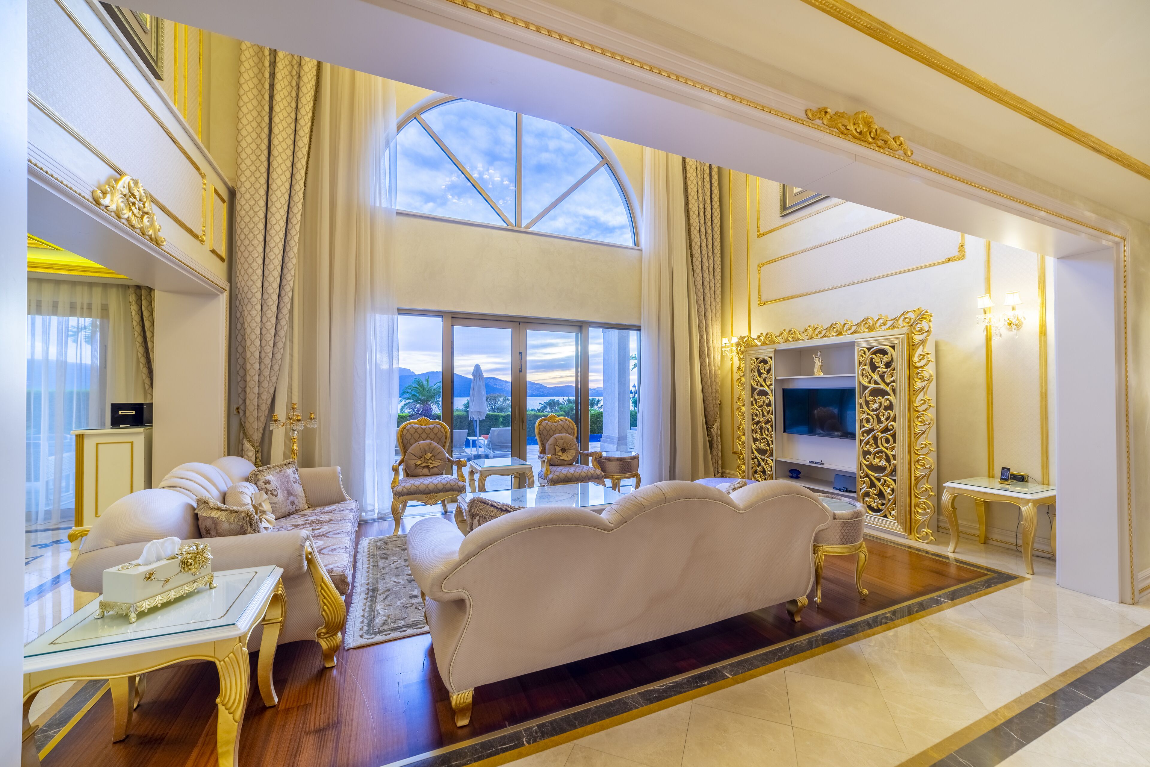 premium villa, 4 bedrooms, private pool, sea view | living area | 45-inch lcd tv with cable channels, tv