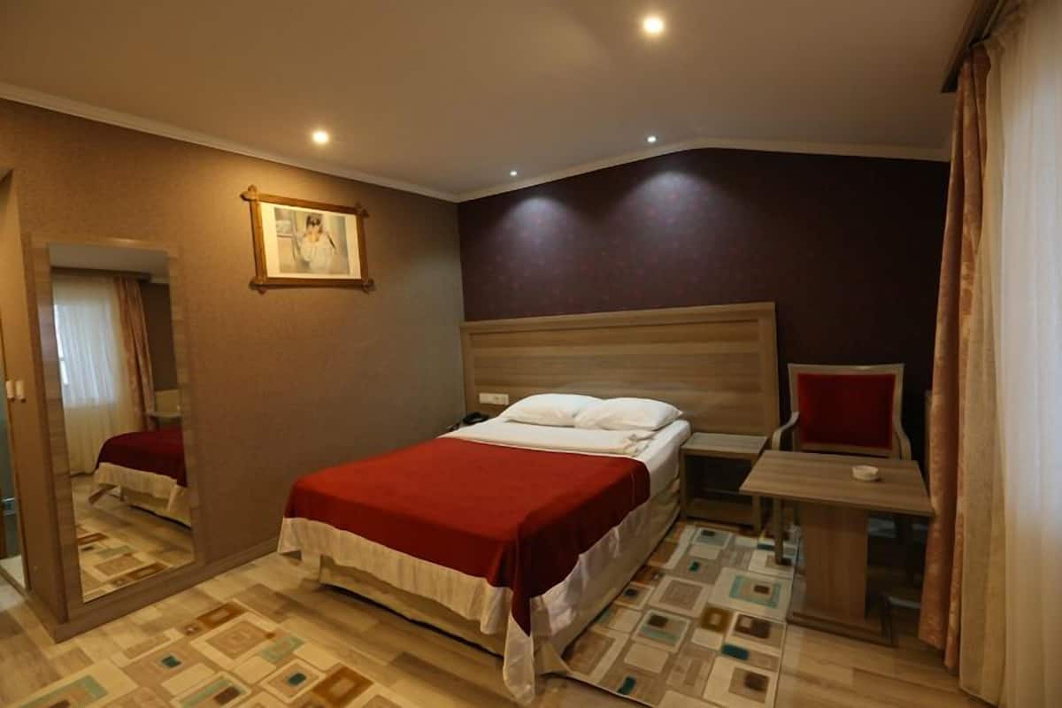 Premium bedding, minibar, desk, rollaway beds