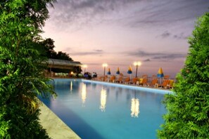 Outdoor pool, pool umbrellas, pool loungers