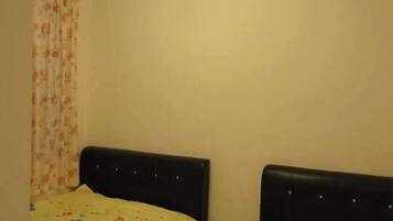 Apartment, 3 Bedrooms | 3 bedrooms, iron/ironing board, bed sheets