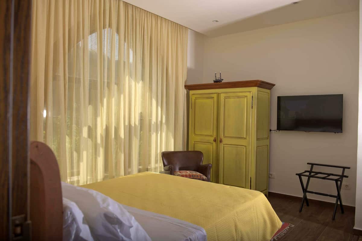 Standard Double Room, City View | Minibar, in-room safe, soundproofing, iron/ironing board