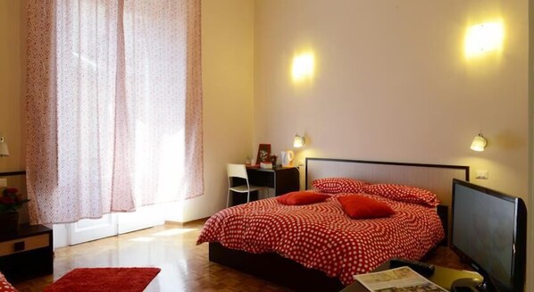 Habitación triple | Escritorio, camas supletorias, wifi gratis