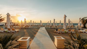 Private beach, sun-loungers, beach umbrellas, beach towels