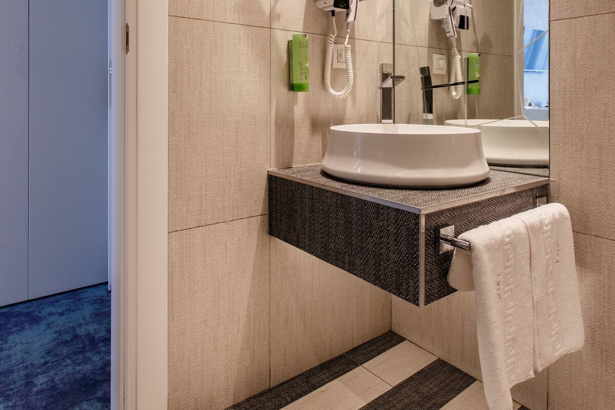 shower, free toiletries, hair dryer, bathrobes