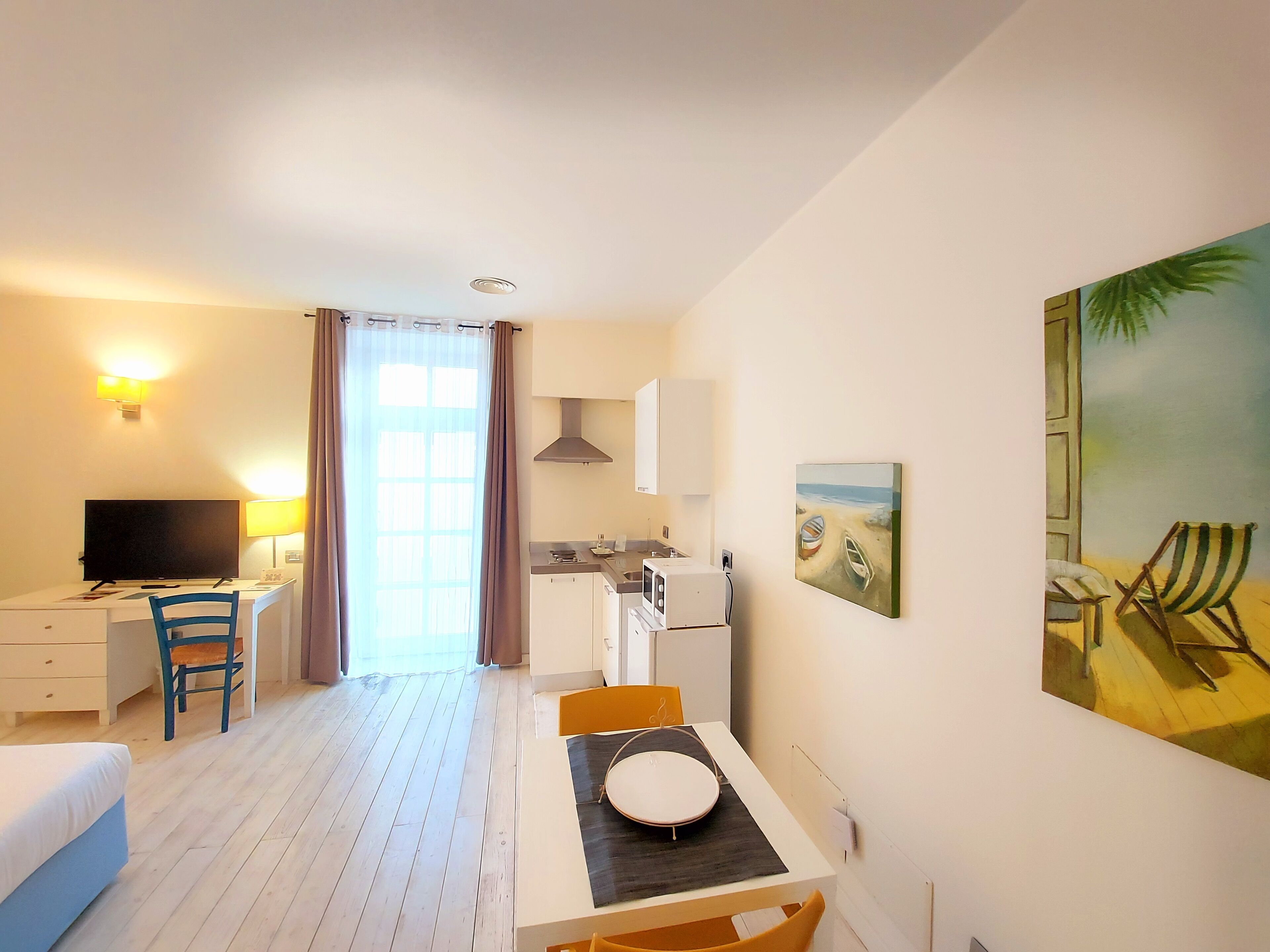 studio | living area | 43-inch led tv with satellite channels, books