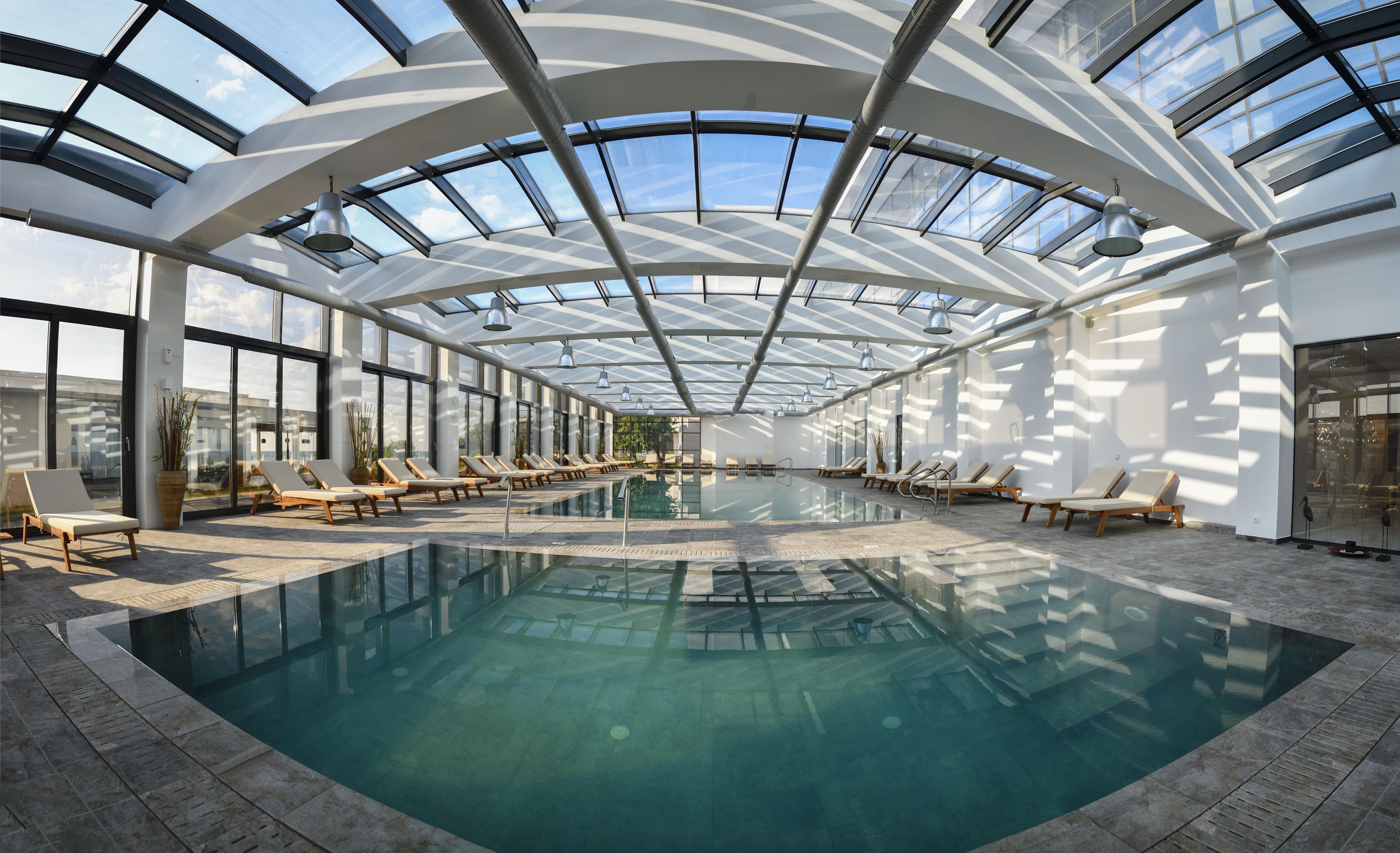 indoor pool, outdoor pool, open 9:00 am to 6:00 pm, pool umbrellas