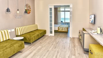 Family Room with Sea View - Free Infinity Pool and Private Beach Access | Living area