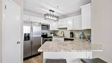 Appart'hÎtel, 2 chambres, balcon, en front de plage | Cuisine privée