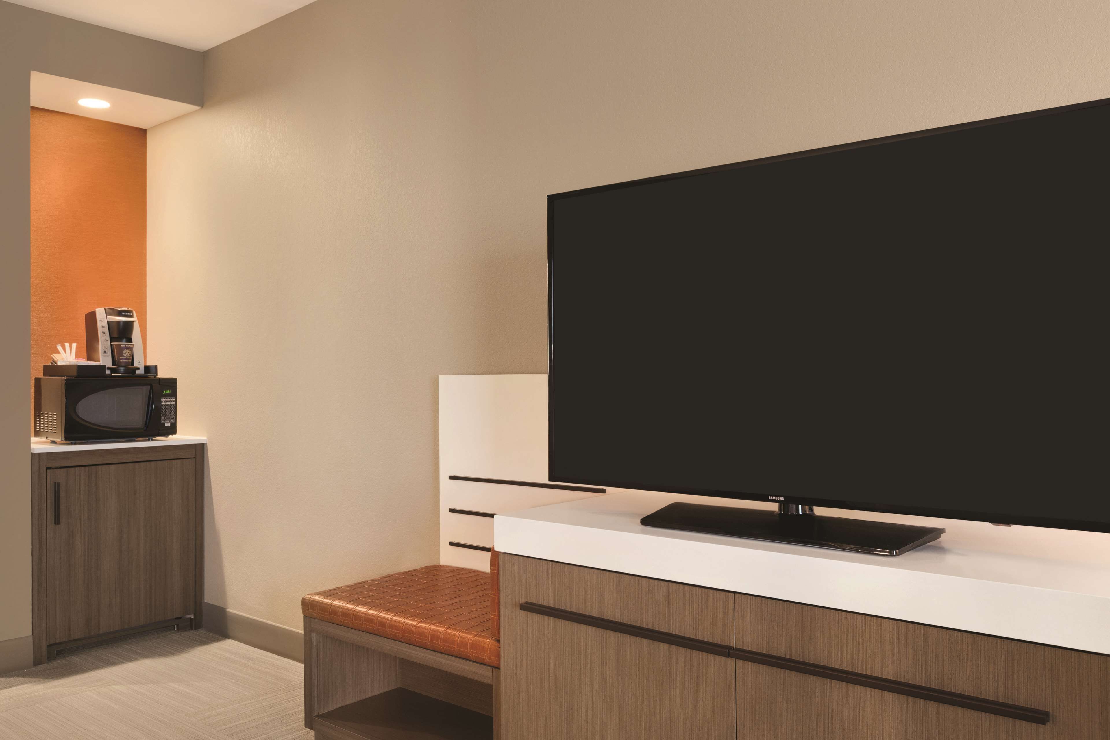 desk, laptop workspace, blackout curtains, iron/ironing board