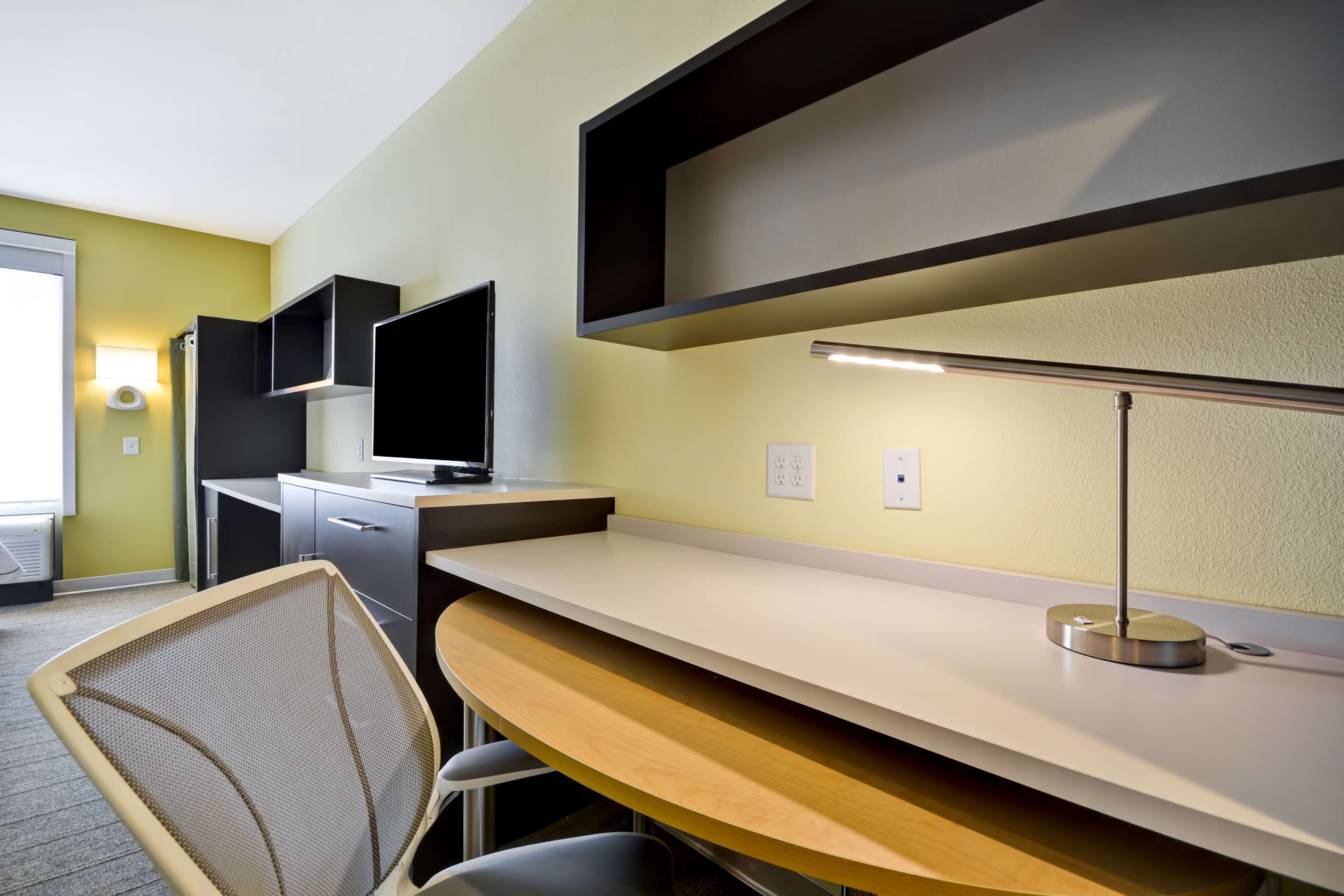 desk, laptop workspace, blackout curtains, iron/ironing board