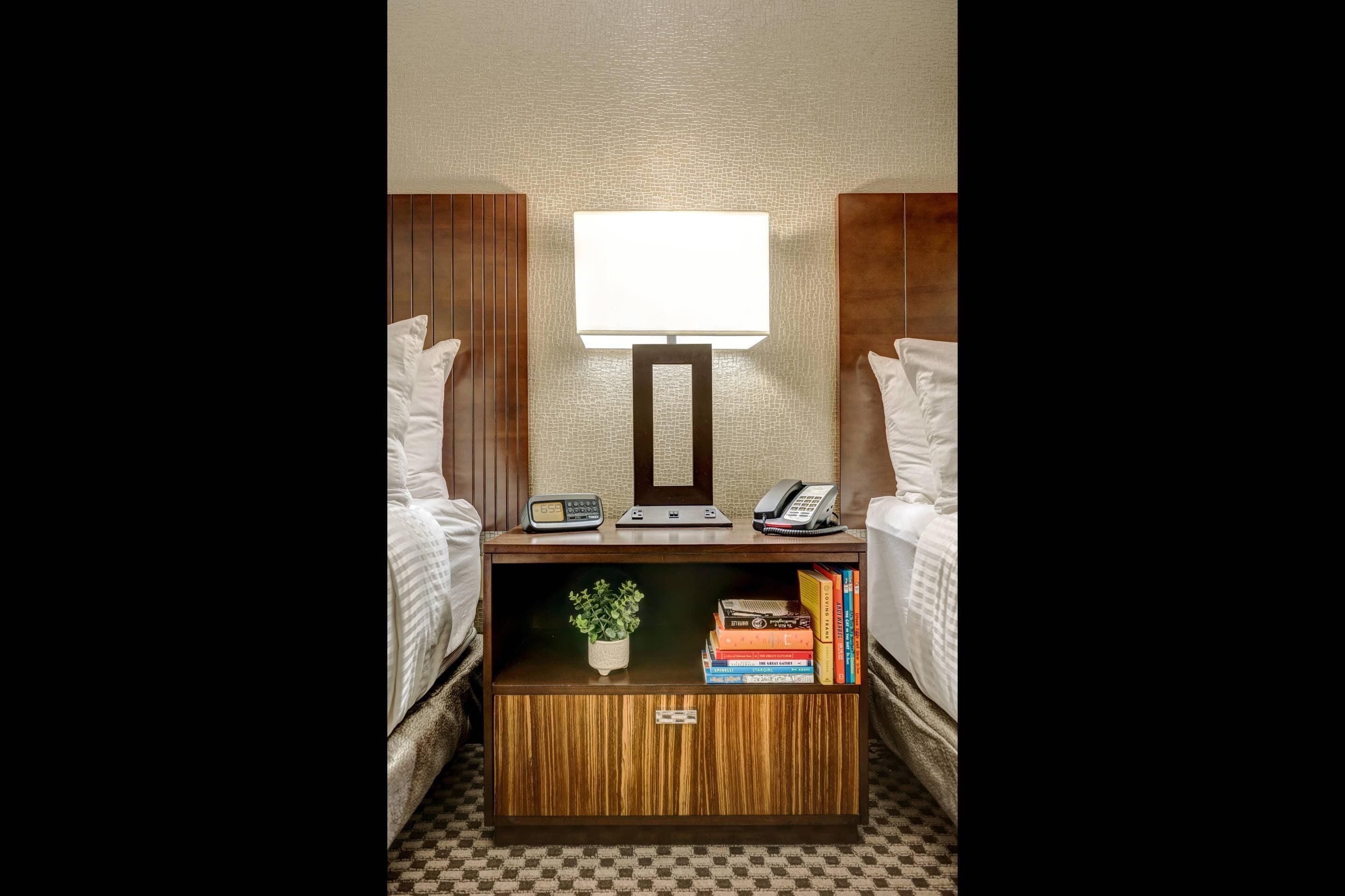 premium bedding, desk, blackout curtains, iron/ironing board