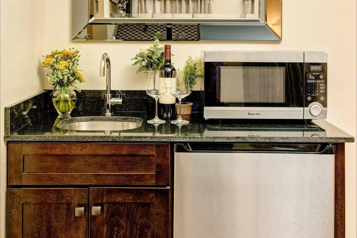 suite, 1 king bed with sofa bed, non smoking | premium bedding, desk, blackout curtains, iron/ironing board