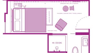 A room layout with a TV, bean bag chair, under-bed drawers, pegboard wall with hangers, foldaway desk, chairs, bench, and a no diving sign.