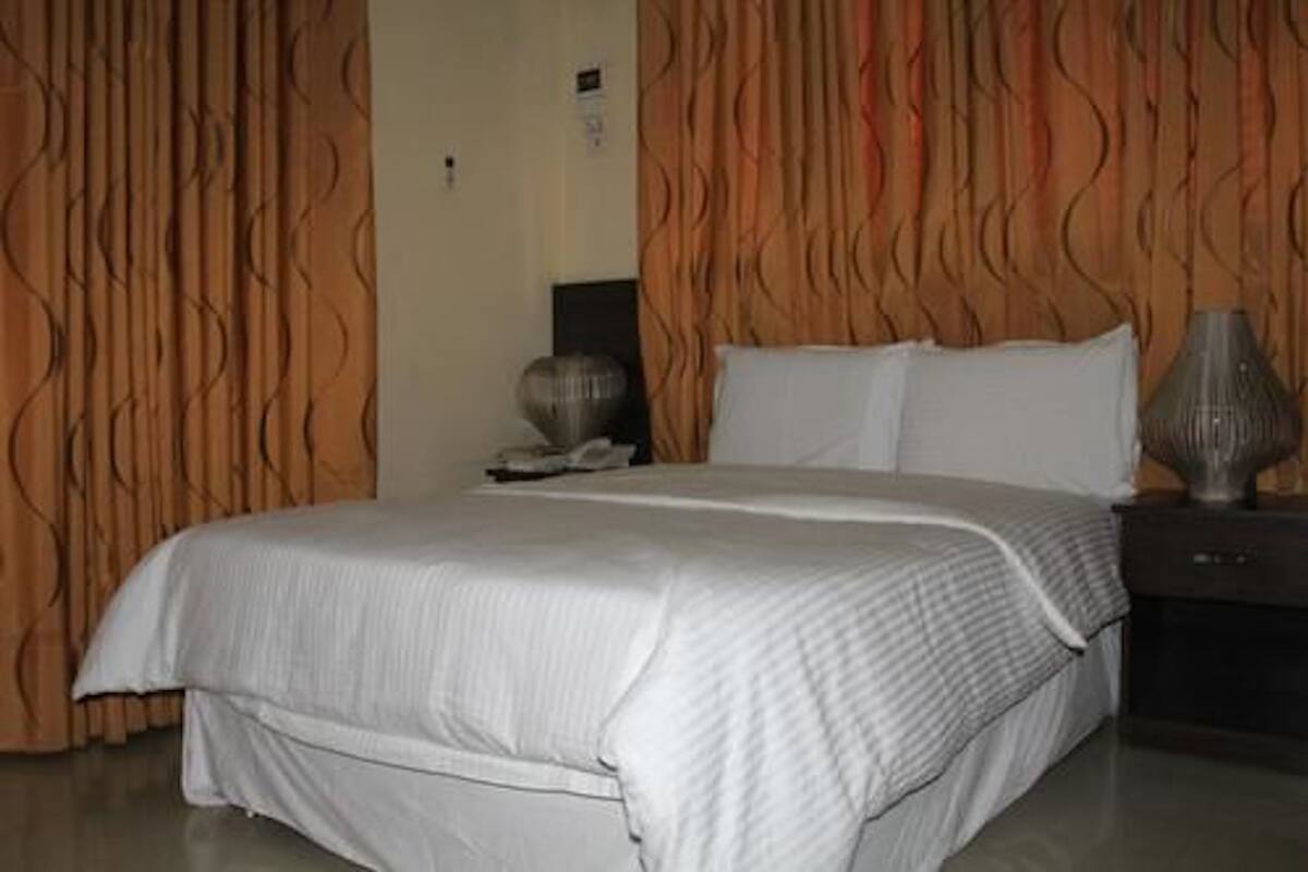 Minibar, desk, laptop workspace, blackout curtains