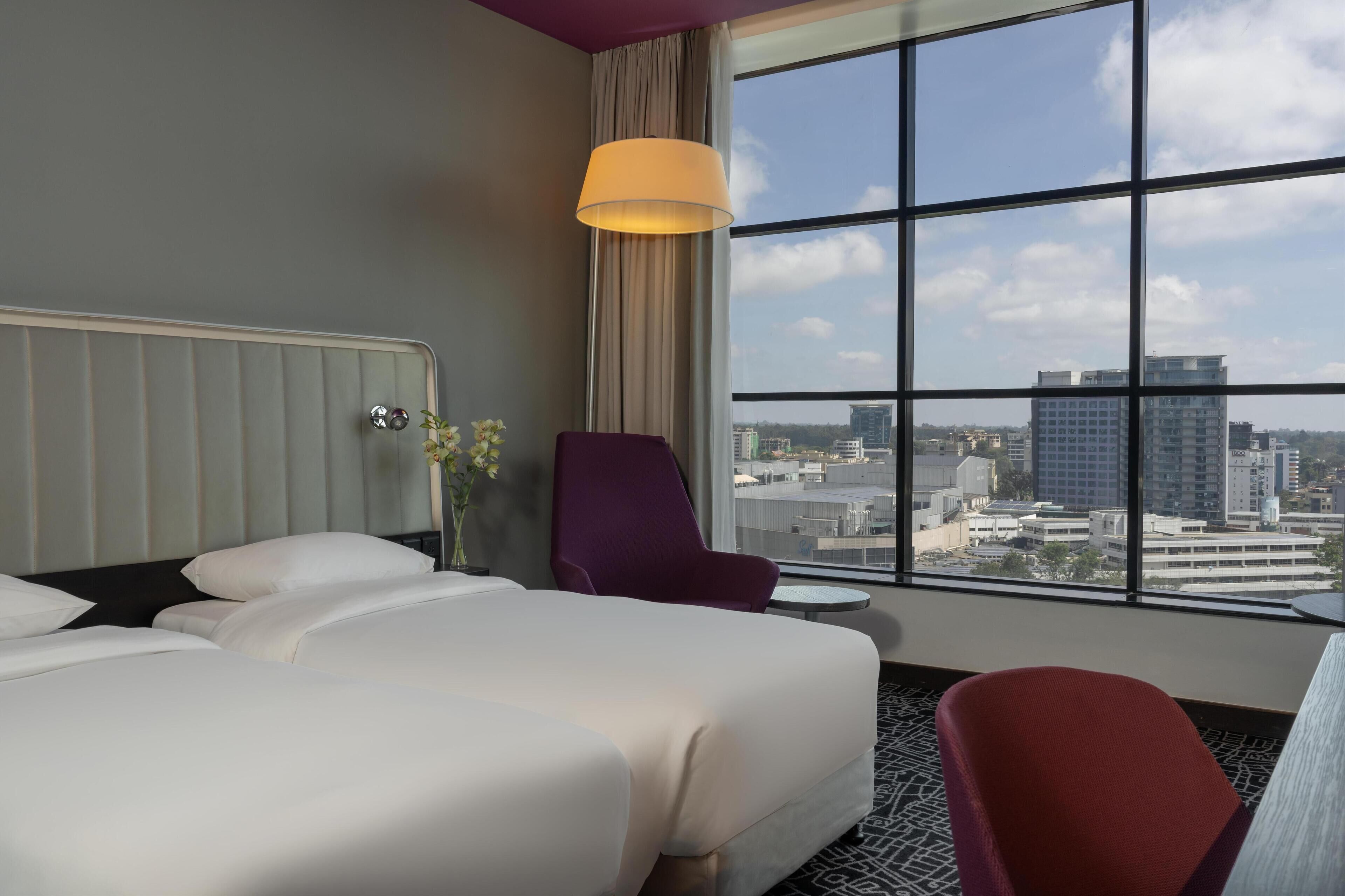 Hypo-allergenic bedding, minibar, in-room safe, desk