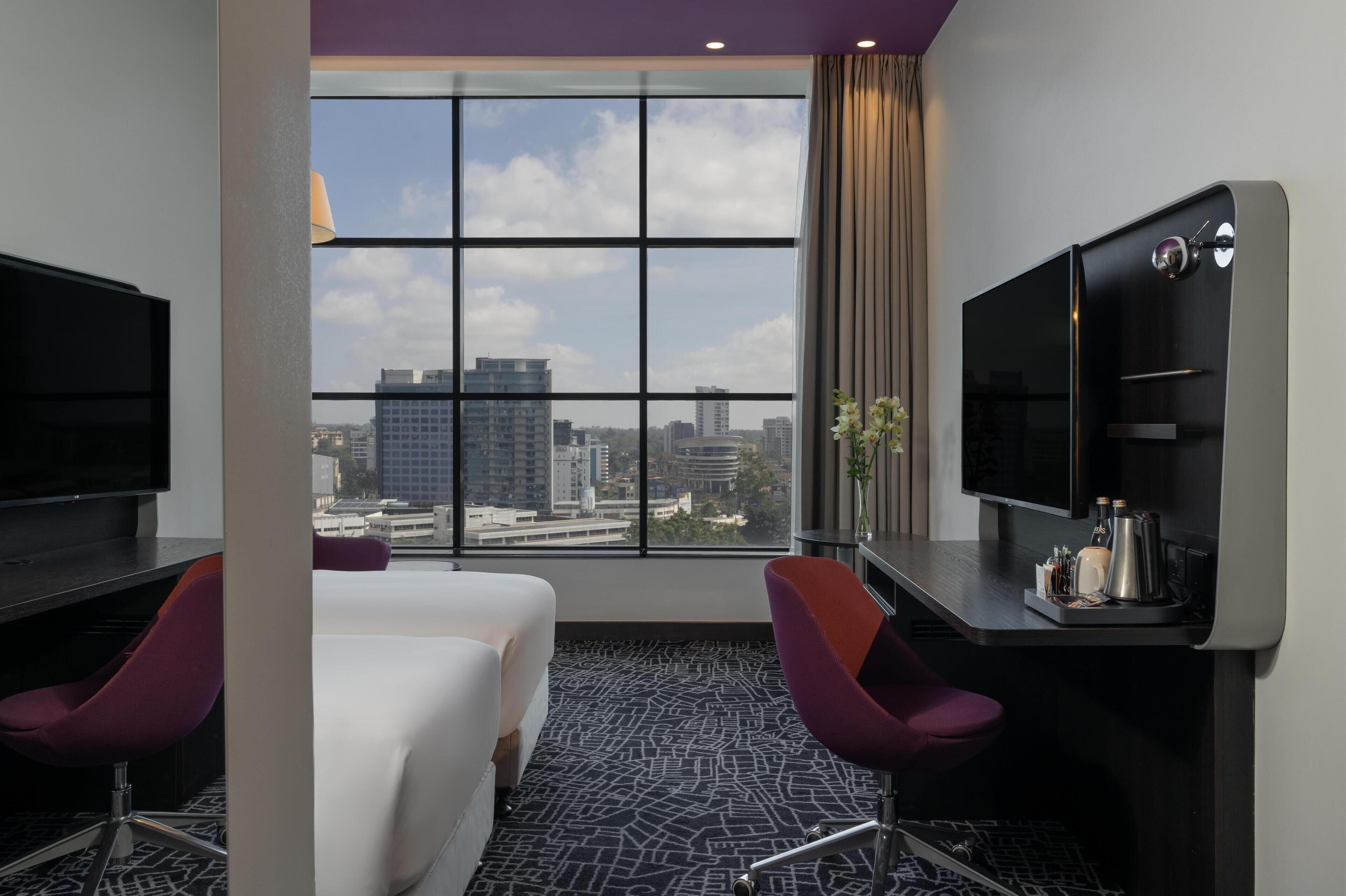 Standard Room, City View | Hypo-allergenic bedding, minibar, in-room safe, desk