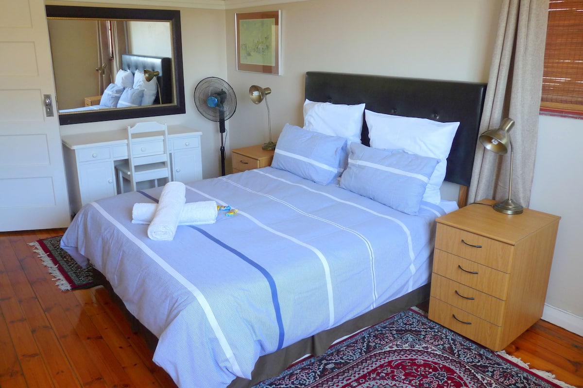 Classic Apartment, 2 Bedrooms, Partial Ocean View | 1 bedroom, in-room safe, laptop workspace, iron/ironing board
