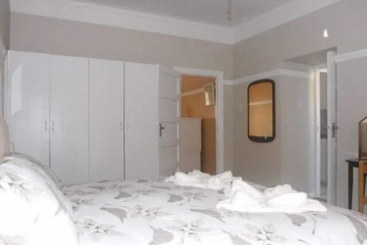 Classic Apartment, 2 Bedrooms, Partial Ocean View | 1 bedroom, in-room safe, laptop workspace, iron/ironing board