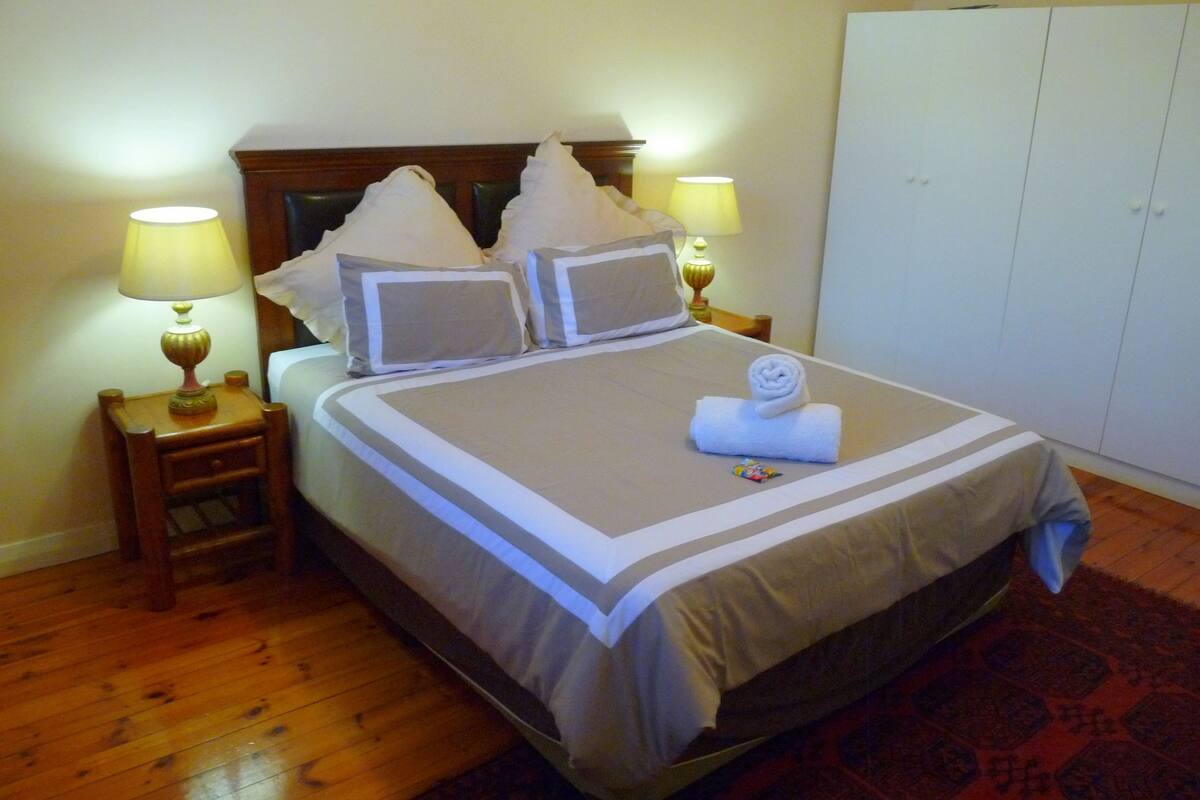 Classic Apartment, 2 Bedrooms, Partial Ocean View | 1 bedroom, in-room safe, laptop workspace, iron/ironing board