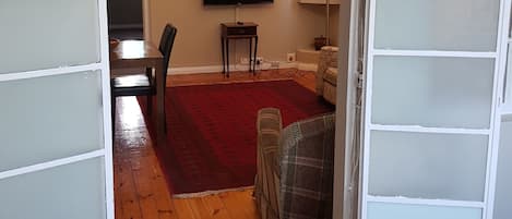 Classic Apartment, 2 Bedrooms, Partial Ocean View | Living room | Flat-screen TV