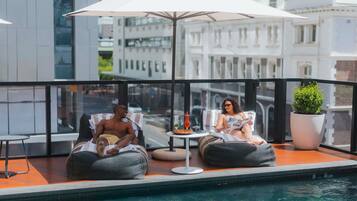 Outdoor pool, open 7:30 AM to 8:30 AM, free cabanas, pool umbrellas