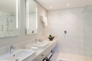 Shower, rainfall showerhead, designer toiletries, hair dryer