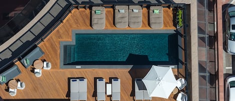 Outdoor pool, open 7:30 AM to 8:30 AM, free pool cabanas, pool umbrellas