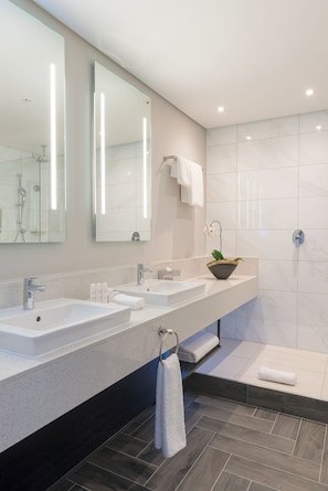 Shower, rainfall showerhead, designer toiletries, hair dryer
