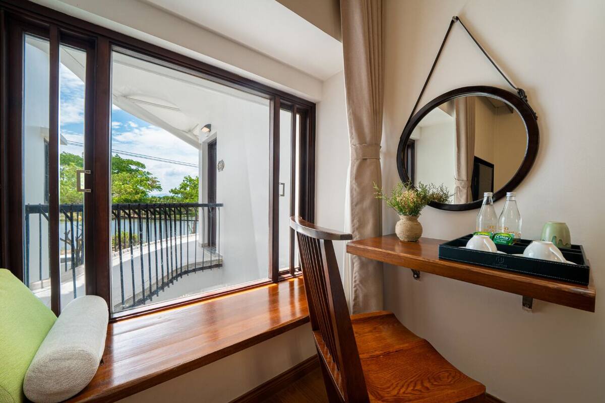 Grand Double Room, River View | Minibar, in-room safe, desk, laptop workspace