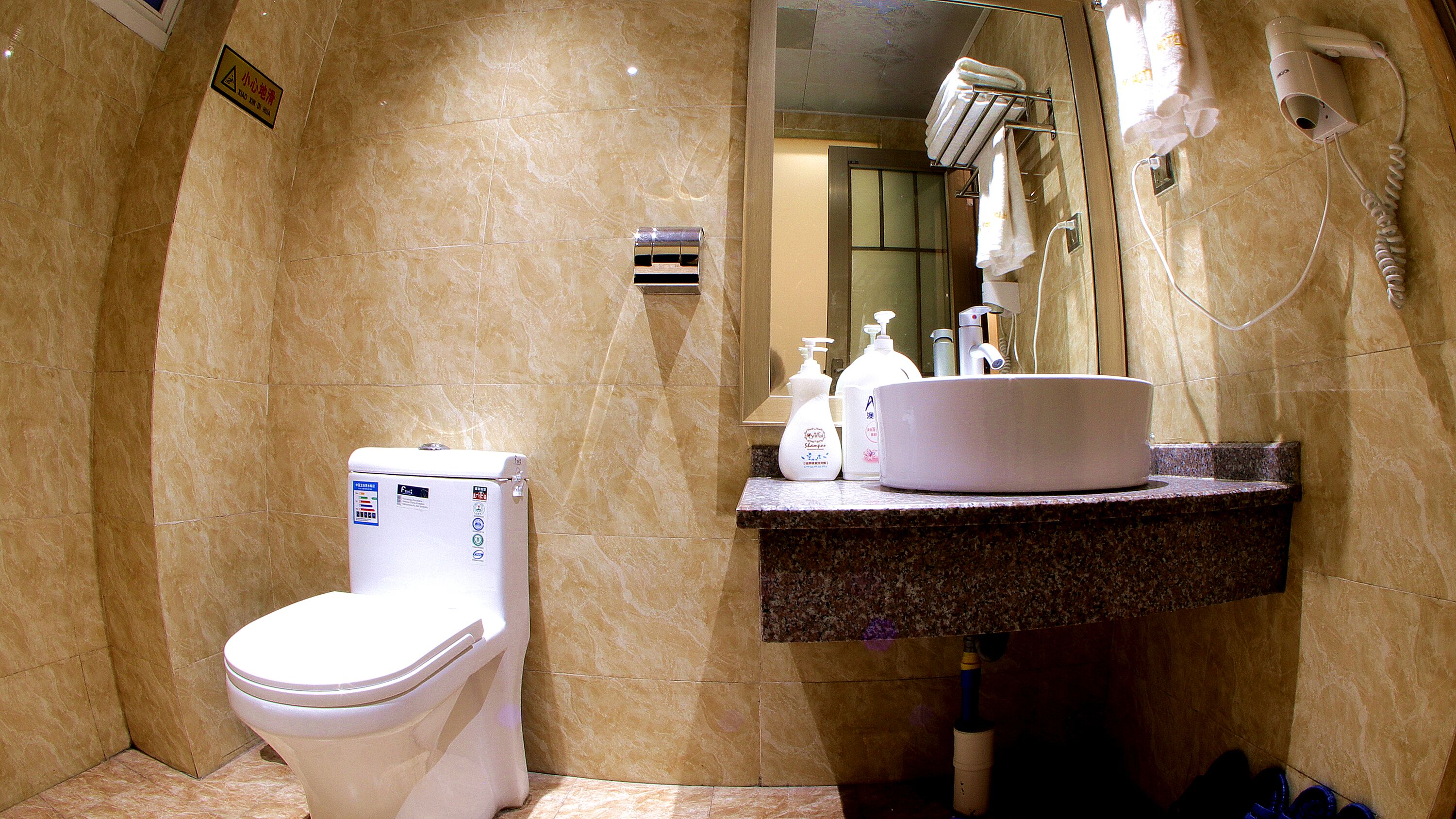 deluxe family room | bathroom | shower, free toiletries, hair dryer, dressing gowns