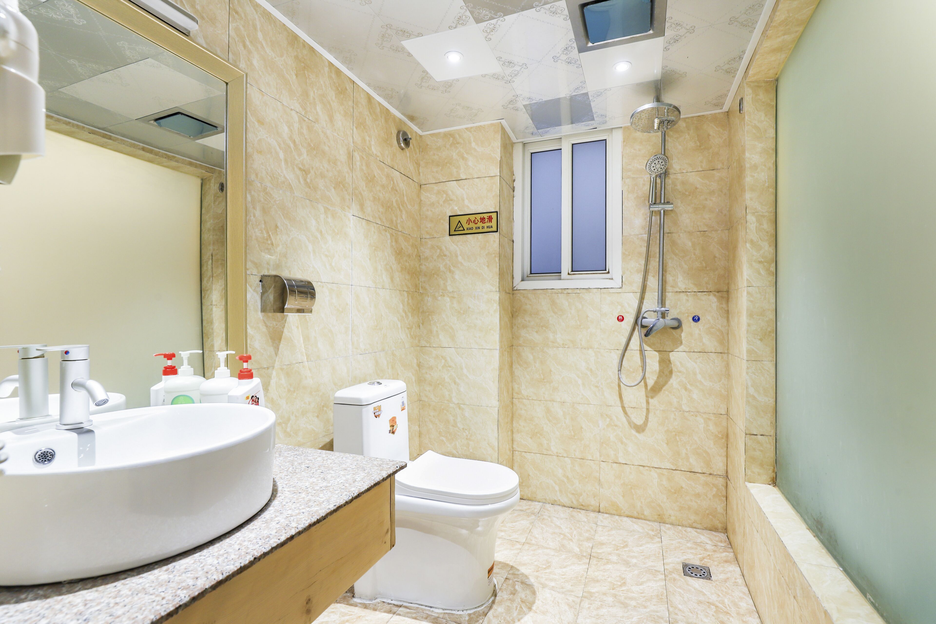 standard twin room | bathroom | shower, free toiletries, hair dryer, dressing gowns