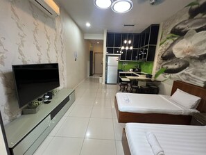 Executive Apartment, 1 Bedroom, City View | Living area | 40-inch Smart TV with cable channels, TV