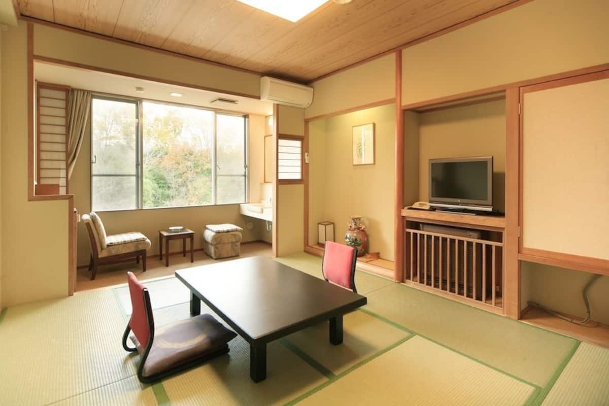 Japanese Style Room with Private Toilet | Living room | Flat-screen TV