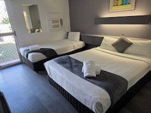 Premium bedding, desk, blackout curtains, iron/ironing board
