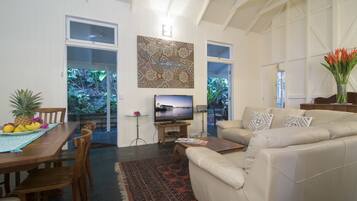 Port Douglas Lodge | Living area | Flat-screen TV, DVD player