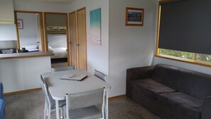 Classic Cabin, 2 Bedrooms | Living area | Flat-screen TV - Bicheno Cabin Park (Bicheno)