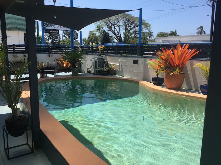 Outdoor pool, open 9:00 AM to 8:00 PM, pool loungers