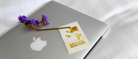 A laptop with a sticker on it.