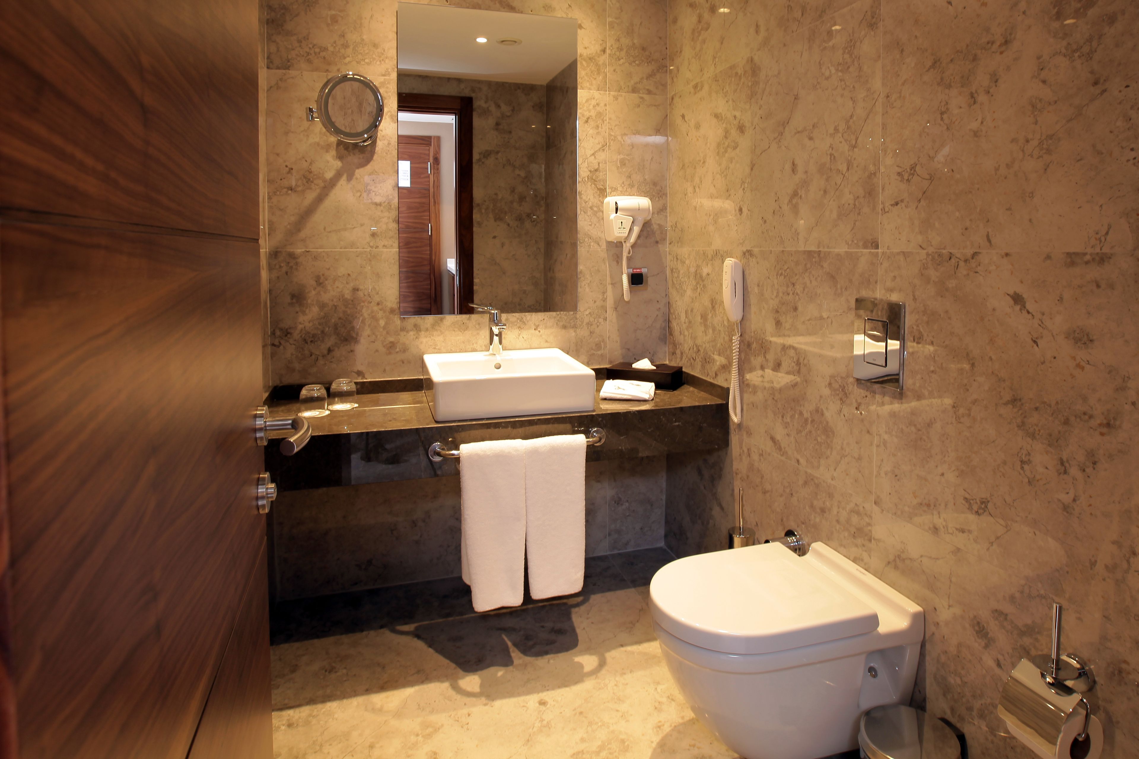 suite (king) with free airport transfer | bathroom sink