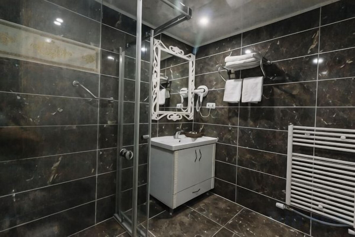 Shower, free toiletries, hair dryer, bathrobes