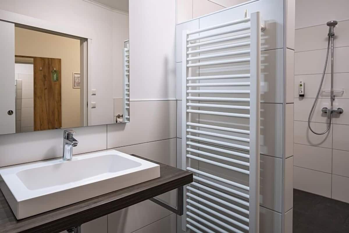 family room | bathroom | shower, free toiletries, hair dryer, heated floors