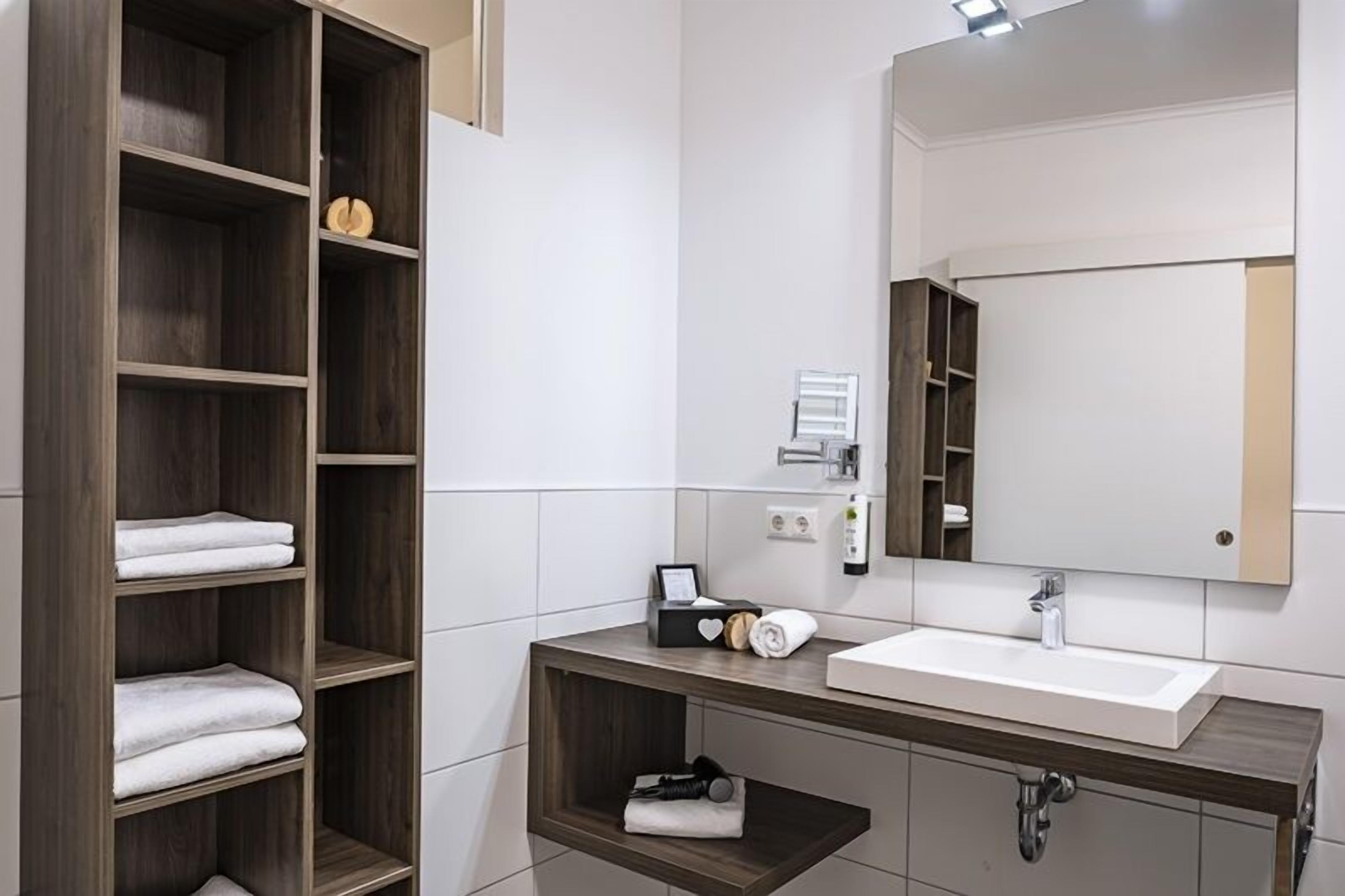 family room | bathroom | shower, free toiletries, hair dryer, heated floors